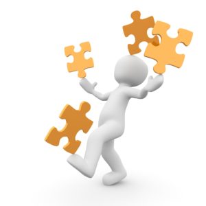 3d model of a person balances puzzle pieces on his foot and hands